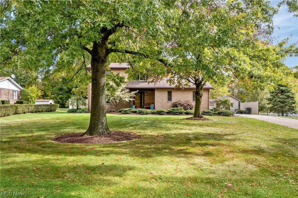 View of front of property with a front yard