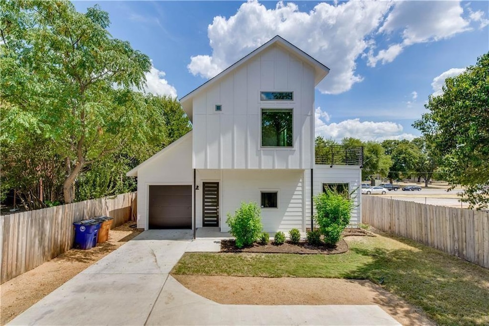 View of front of home with board and batten sidin