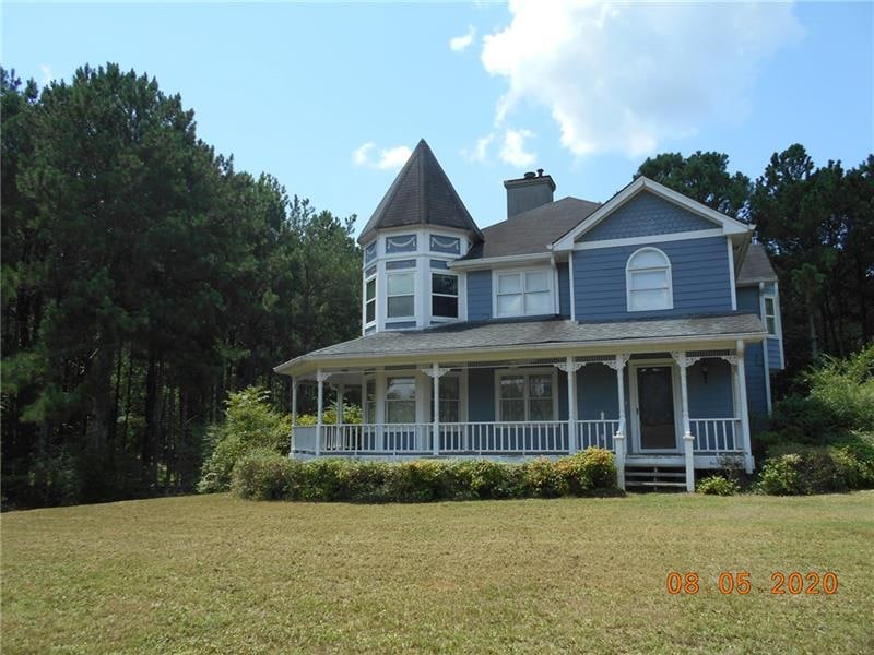 Front of house, wrap around porch