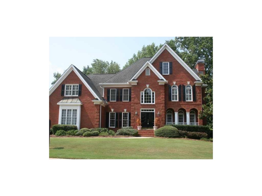 Exterior Front. Lovely updated brick on over a hal