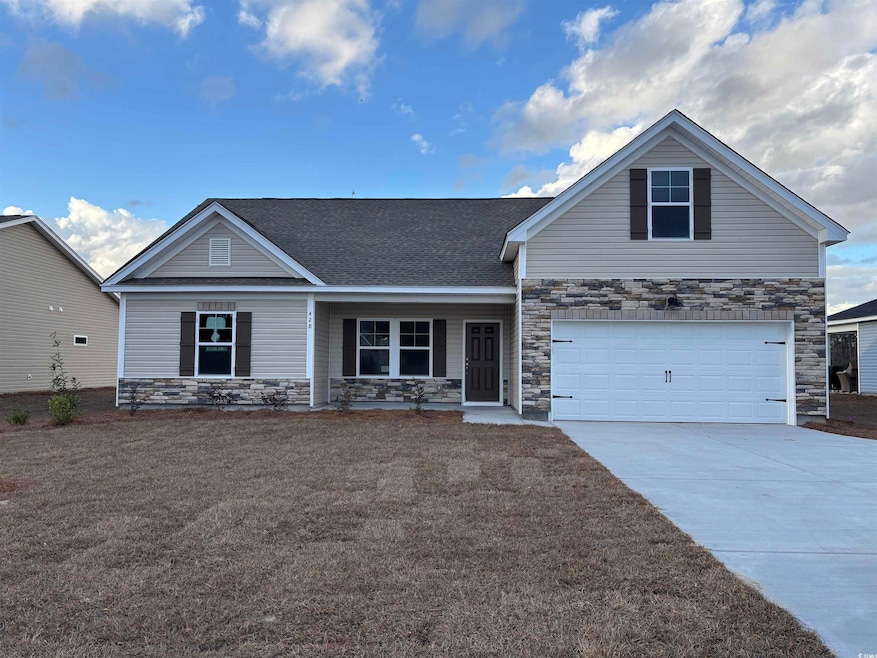 View of front of home with a garage