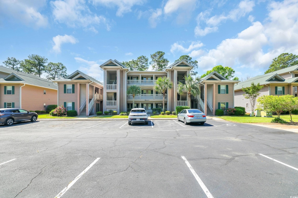 Exterior space featuring uncovered parking