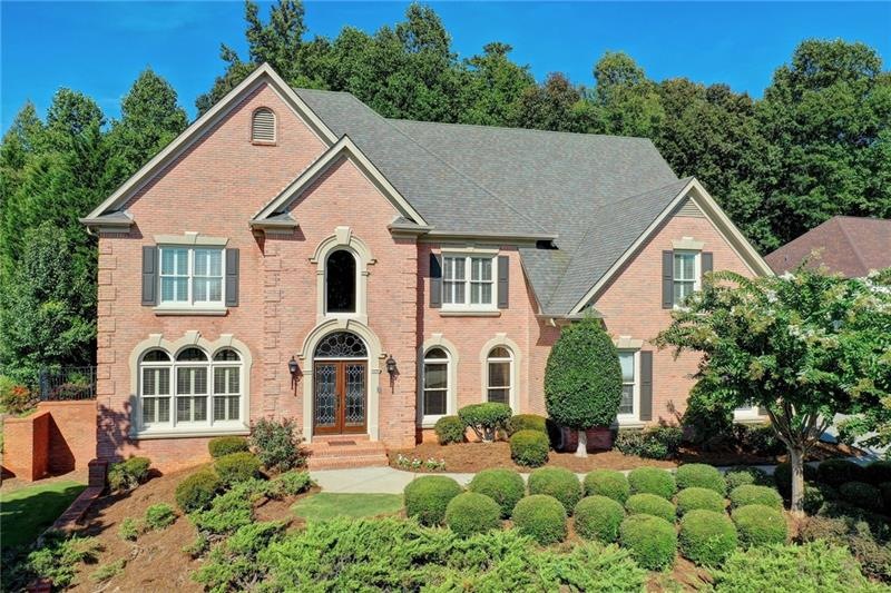 Stunning 3 sided brick beauty located on private w
