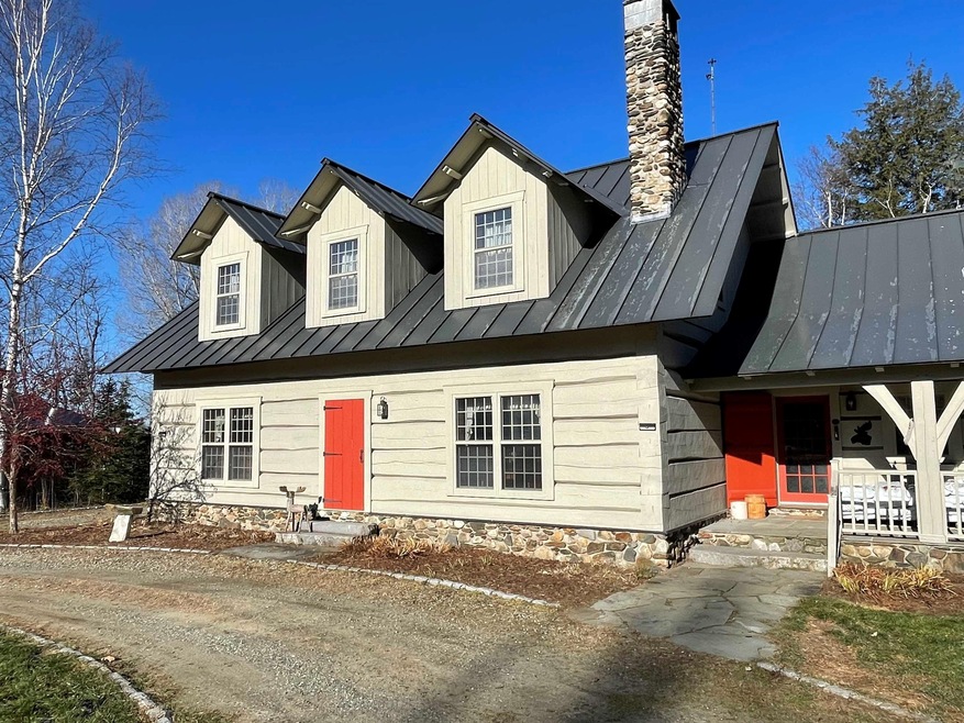 This home faces Burke Mtn and offers great views o