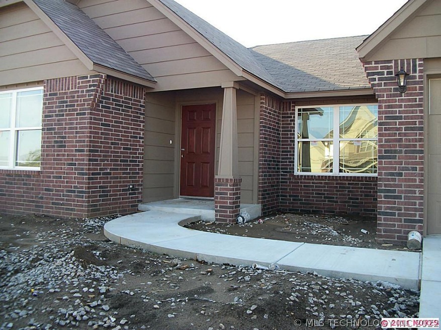 Front view of home. 5000 sf of sod will be install