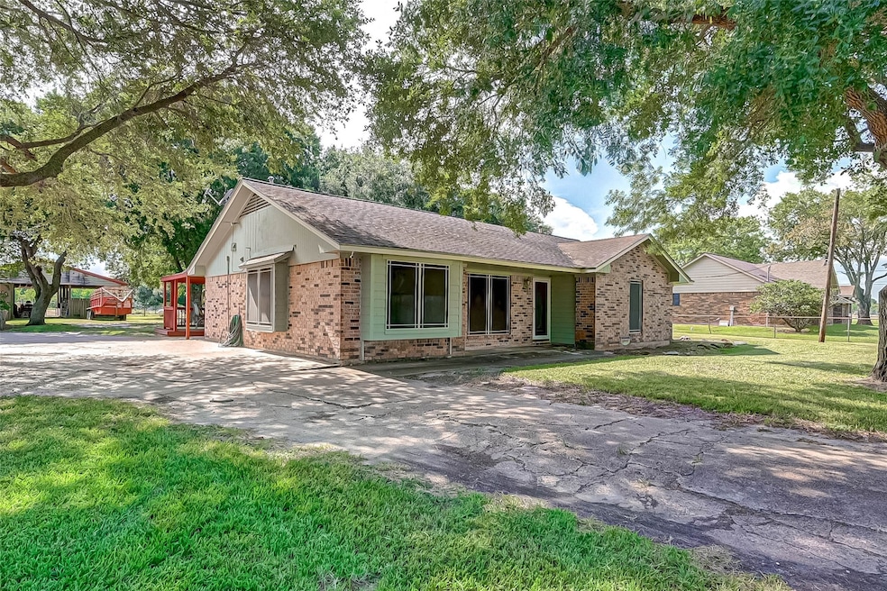 Entrance to this beautiful property includes a lon