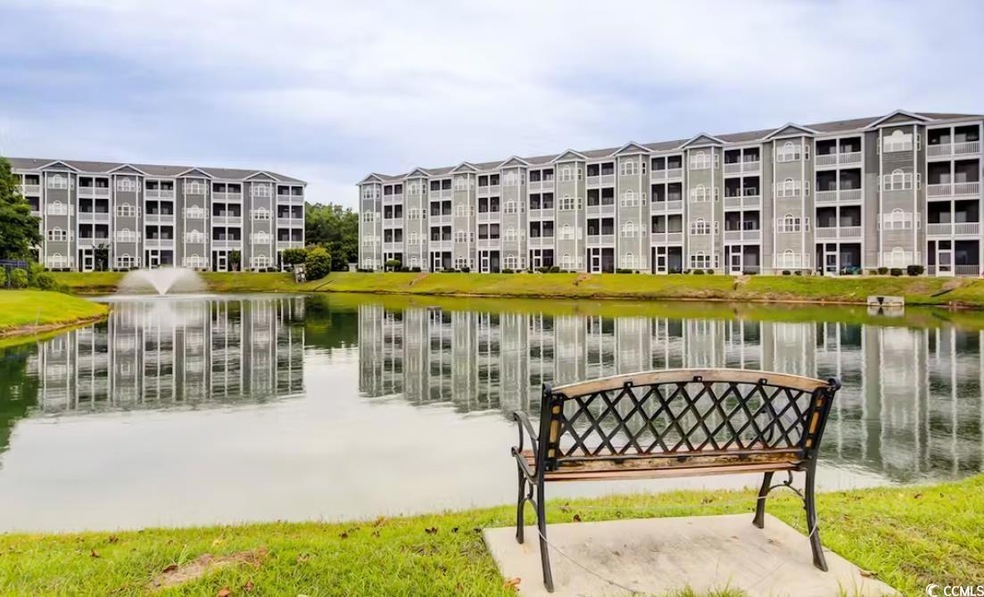 View of community featuring a water view