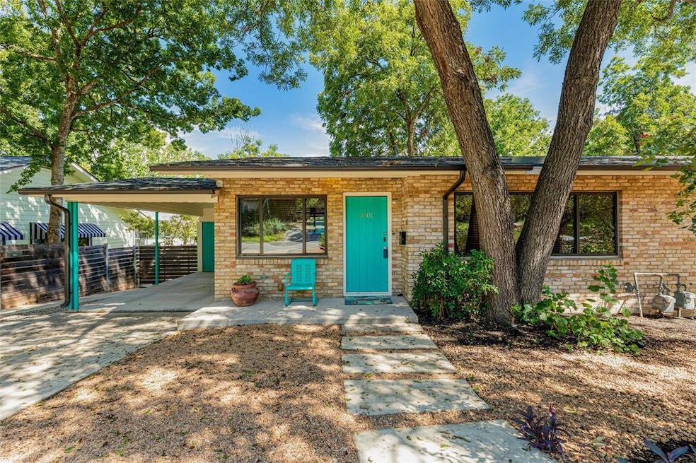 View of front of house with an attached carport, 