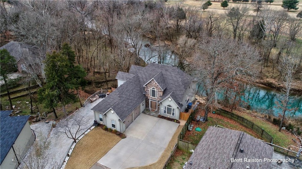 Aerial view of home and Little Sugar Creek