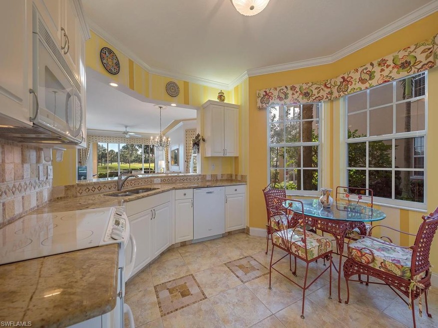 Granite Eat-in Kitchen with Breakfast Bar and Bay 