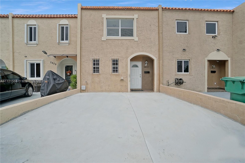 Front of home. 2 parking in front.