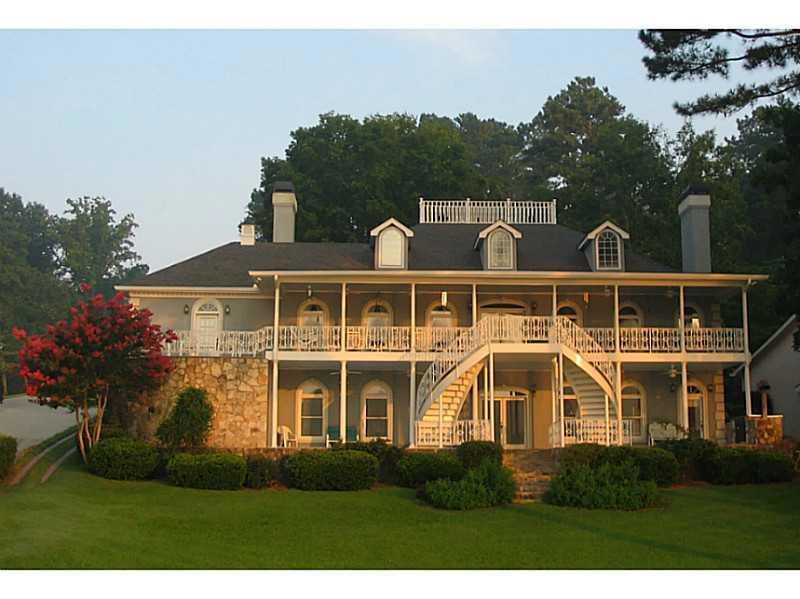 Exterior Front. Lake Lanier is only steps from the