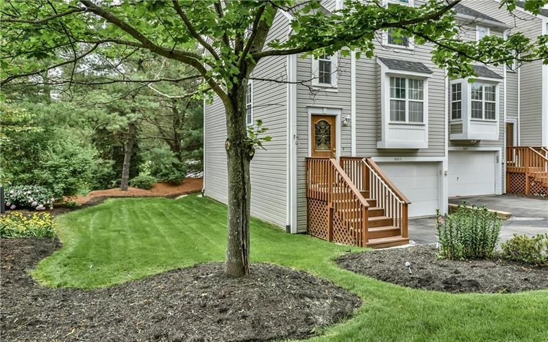 Spacious end unit in the desirable neighborhood of