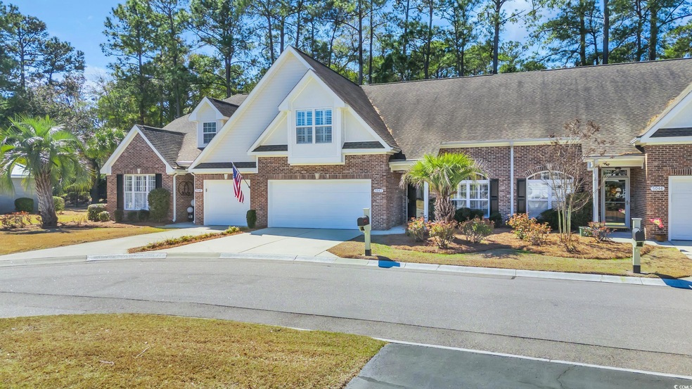 View of front of house with an attached garage, a 