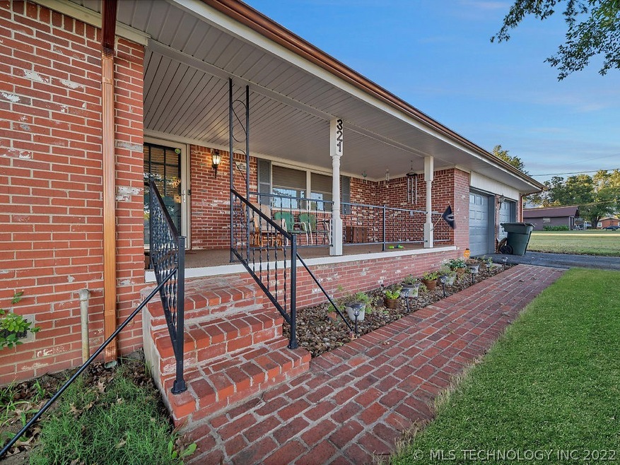 Beautiful Brick walkway leads to an inviting and l