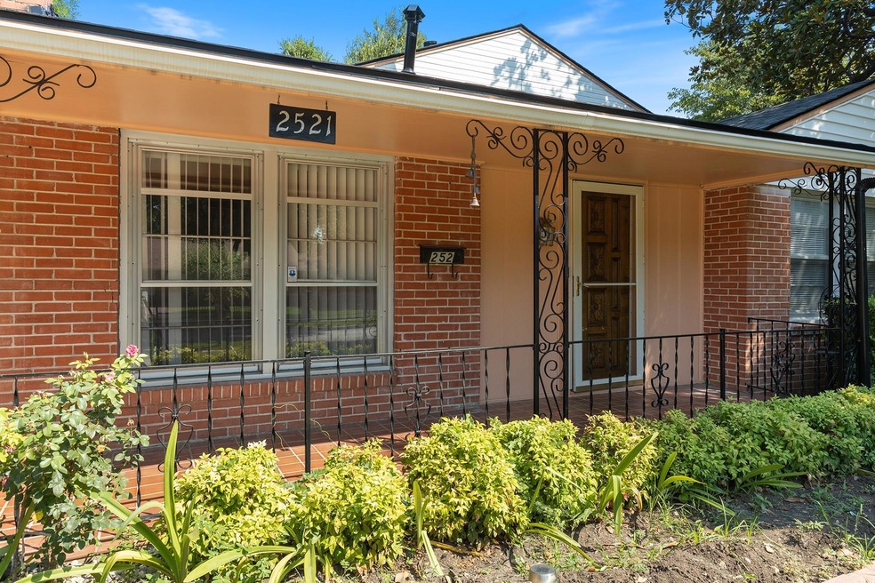 Single story home with a garage, a front yard, and