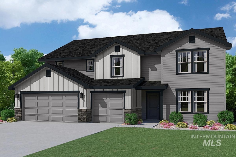 View of front facade featuring board and batten siding, a front yard, concrete driveway, and stone siding