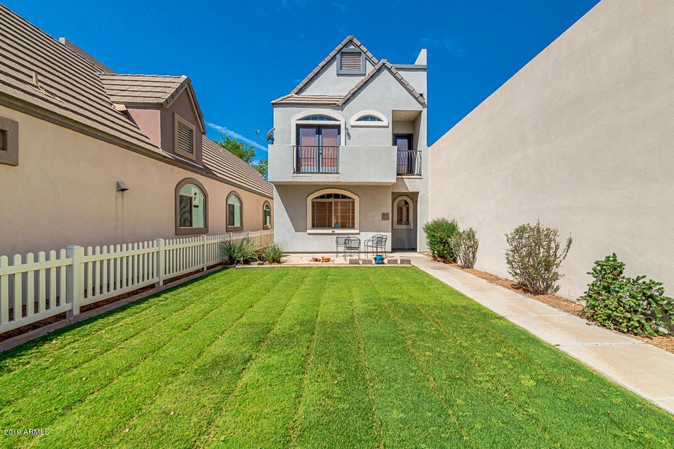 Front yard -picket fence surrounds