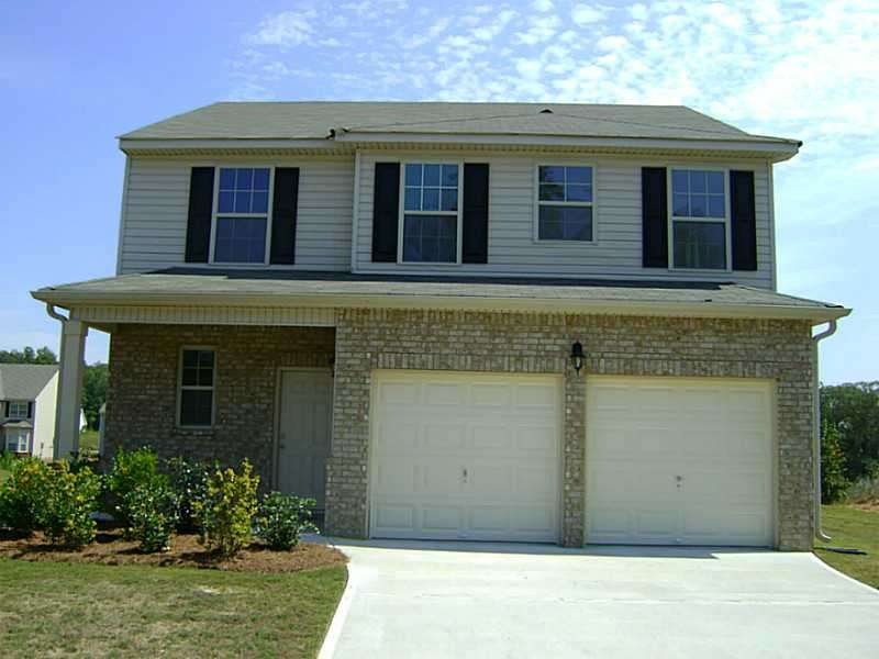 Exterior Front. Lot of Home for the Money