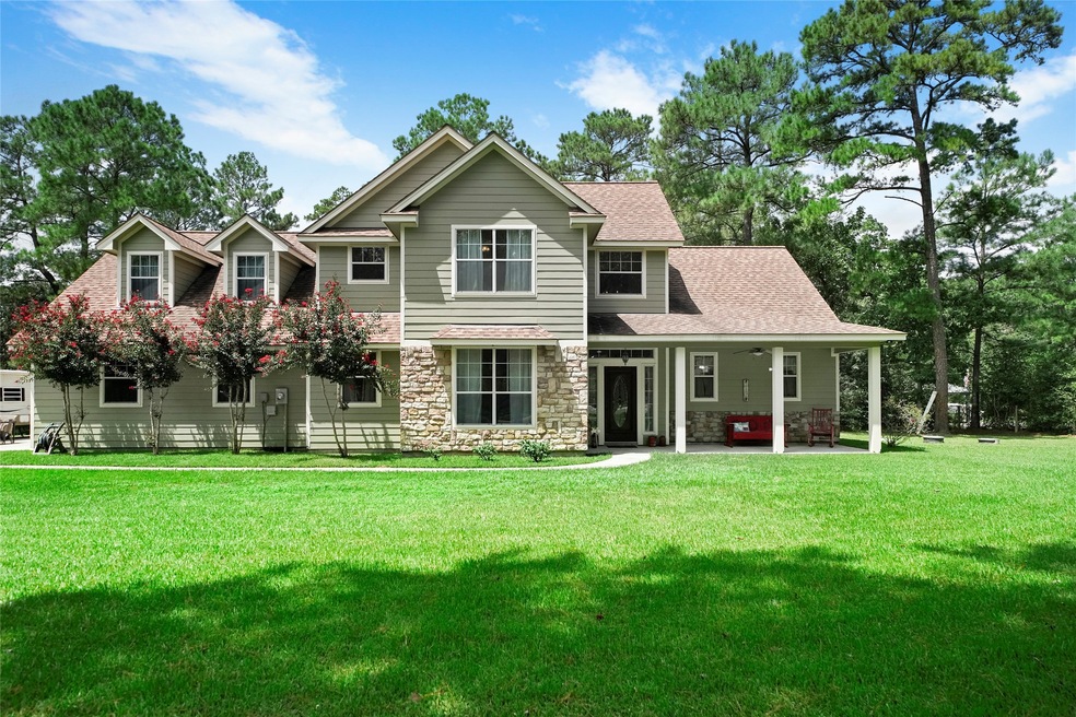 What a True country BEAUTY! From the beautiful exterior paint, to the recent roof that compliments the colors in the stone accents of this home, to the fabulous front porch and the gorgeous elevation, to the pop of color the crepe myrtles add, this place is captivating.  When you enter, immediately you feel the warmth of this country charmer.  You are welcomed by a two story entry, formal dining room, open living area that looks into the spacious kitchen, abundance of windows, breakfast area and sunroom.