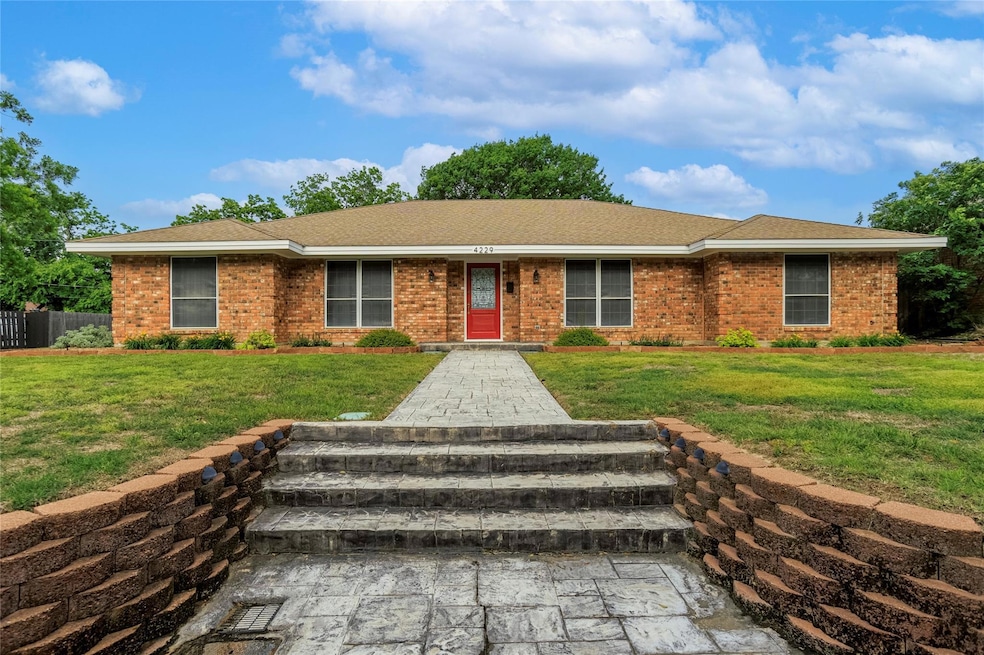 Ranch-style house with good-sized yard.