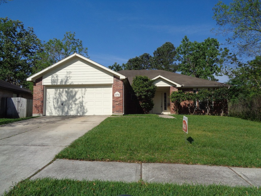 16734 Gleneagle Dr N, Conroe, TX 77385 - photo 1
