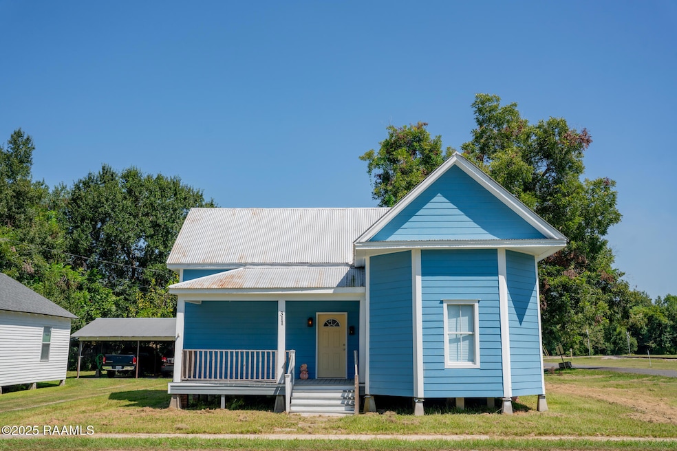 311 S Guegnon St, Abbeville, LA 70510 - photo 1