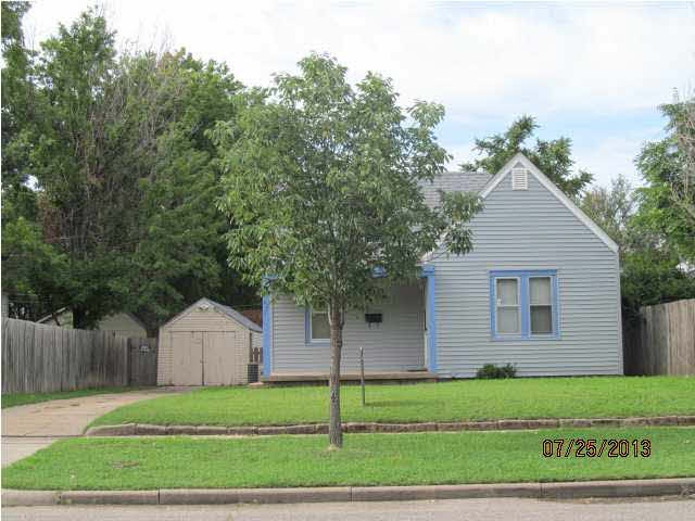 Front of home facing north, with covered front por