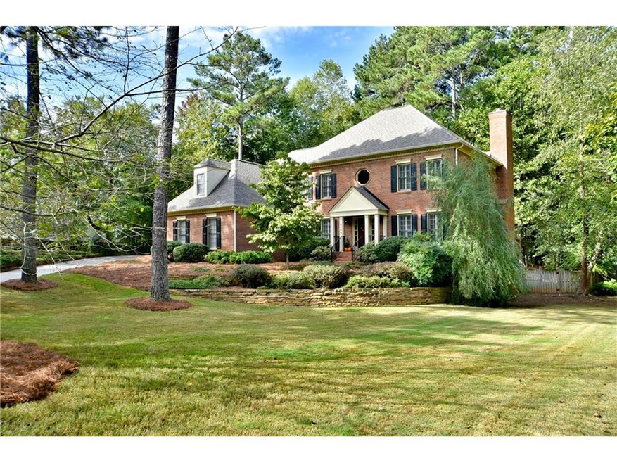 Front View of Property. Long driveway. Huge level 