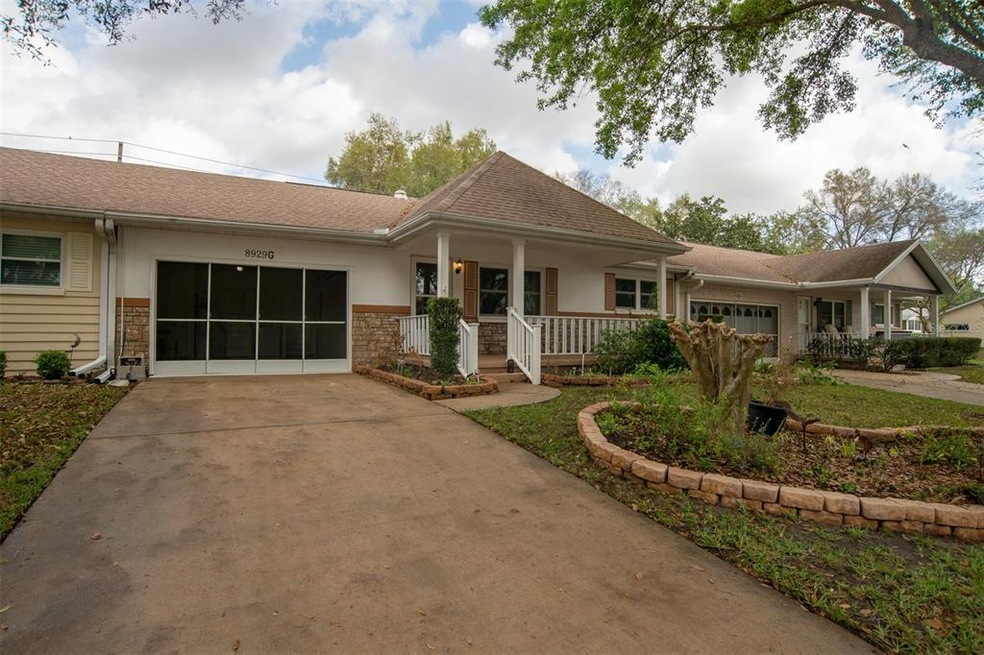 Front of Home with Flower Beds 