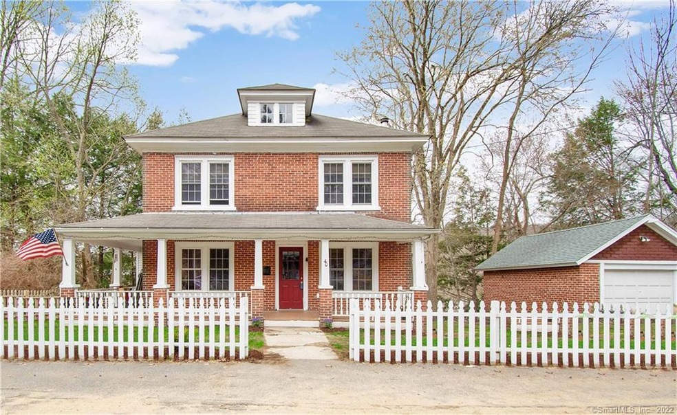Make this stately colonial with white picket fence