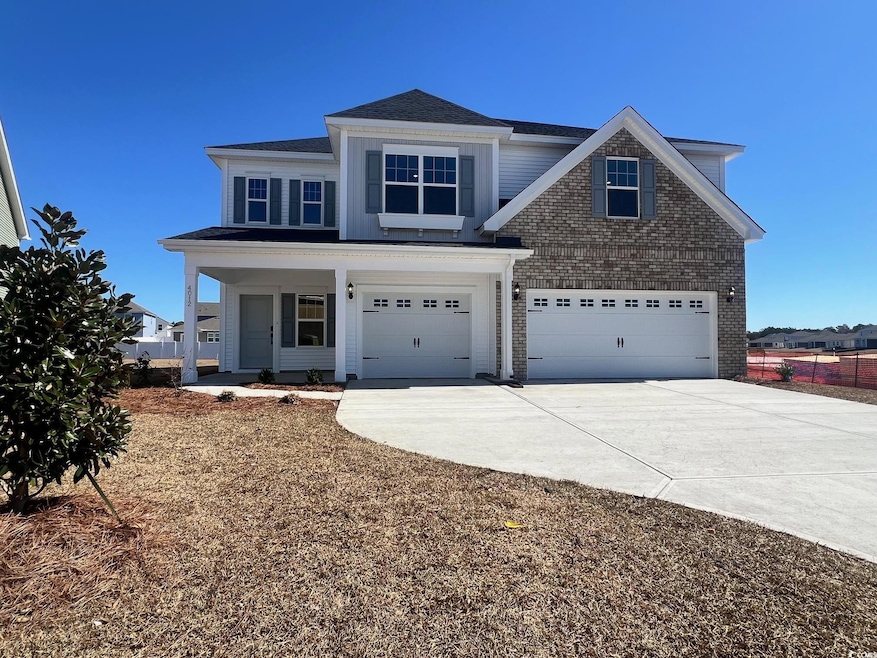 View of front of house featuring brick siding, con