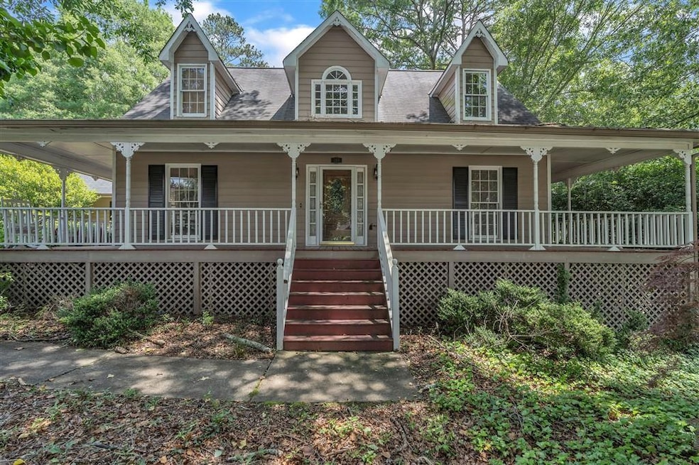 Farmhouse inspired home with a porch