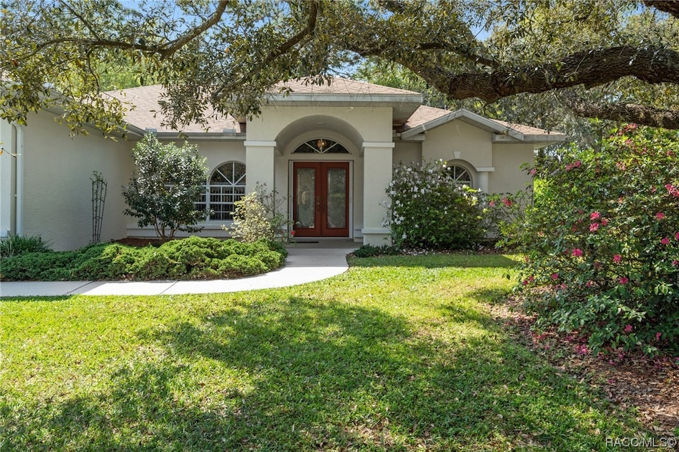 Beautiful landscaping encompasses this home proper