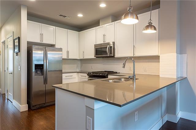 Gourmet kitchen is loaded with all stainless appli