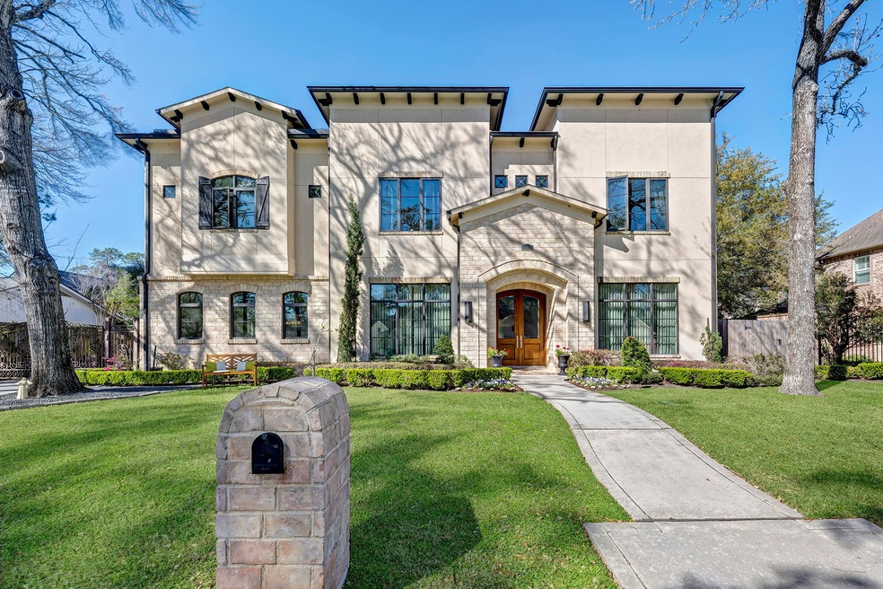 An exquisite home with all wood floors . throughou