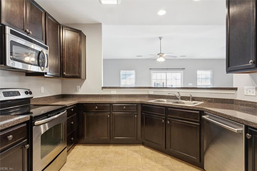 Kitchen overlooking the open living space and balc