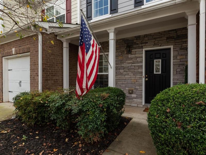 Private front entrance with covered porch.