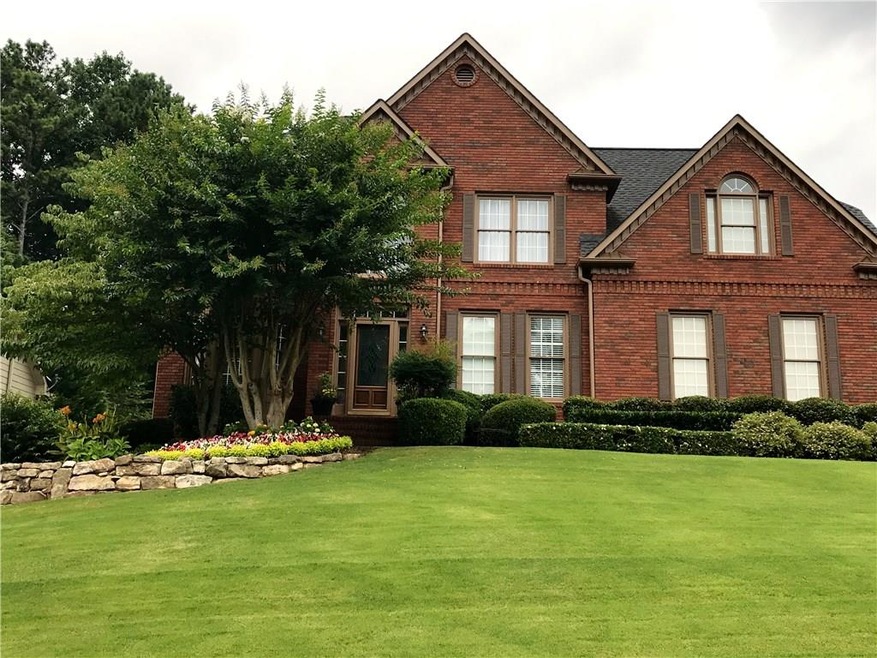 Stunning Corner Lot Tradition in Allatoona High di