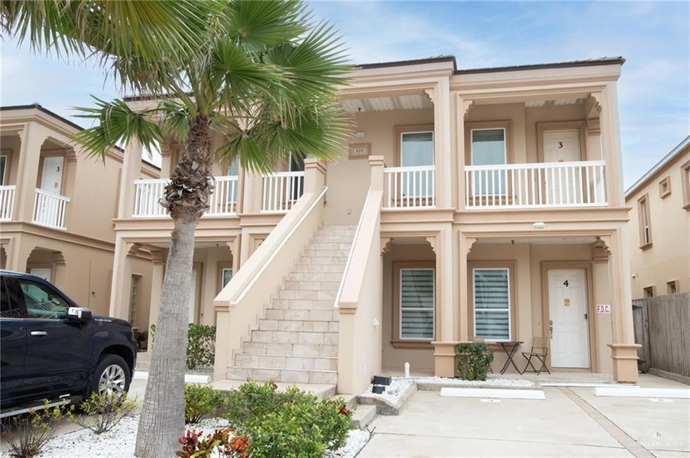 View of property with a balcony