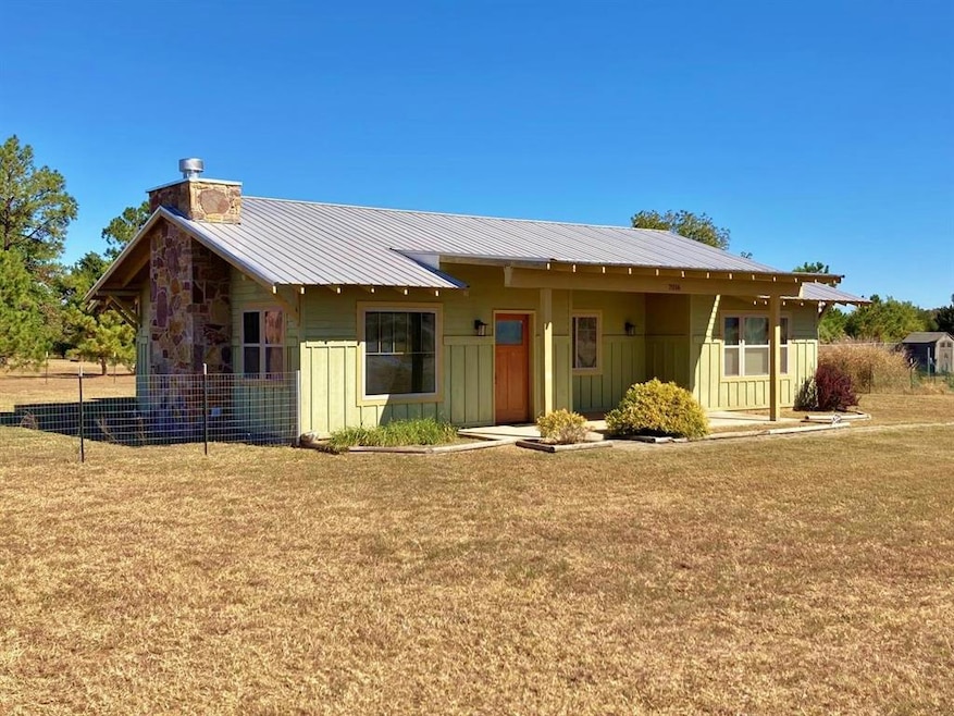 View of front of house with a front yard