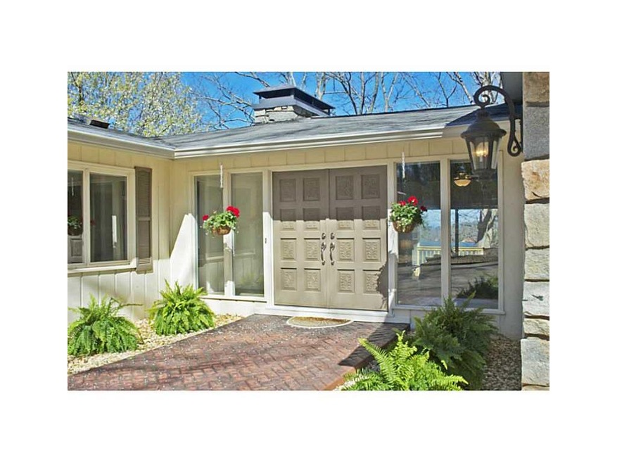 Exterior Front. Beautiful Level entry with a LAKE 