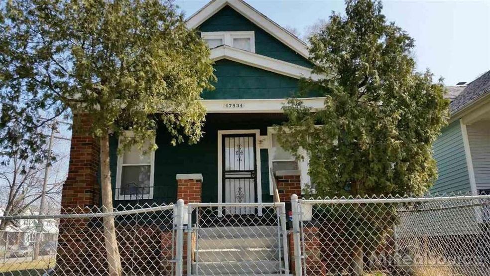 Fenced yard, covered porch, 2 car detached garage