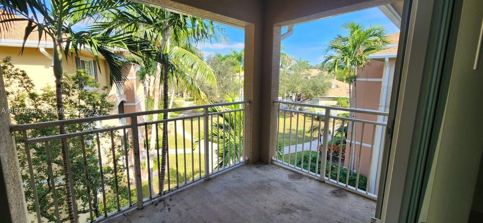 6505 Emerald Dunes Dr unit 307, West Palm Beach, FL 33411 - photo 1