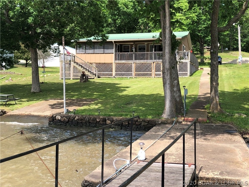 Gorgeous gentle lot for this lakefront home!