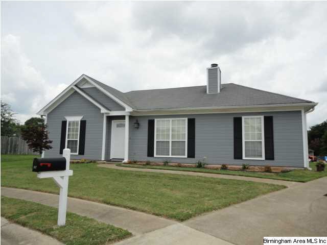Driveway leads to 2 car garage