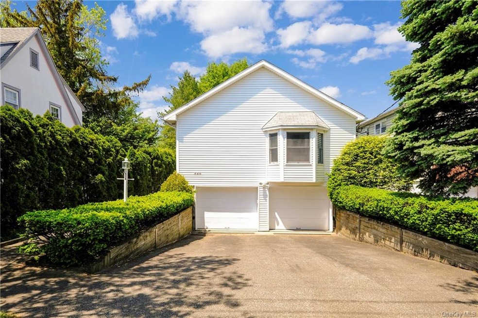 Home features large 2-car garage and driveway that