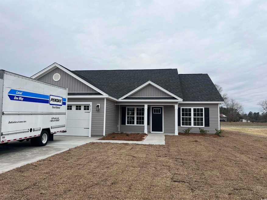 View of front of home featuring a front lawn and a