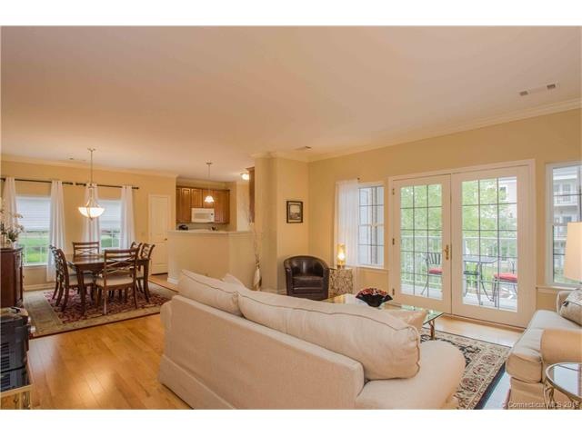 This beautiful  2 bedroom + den corner unit is bei