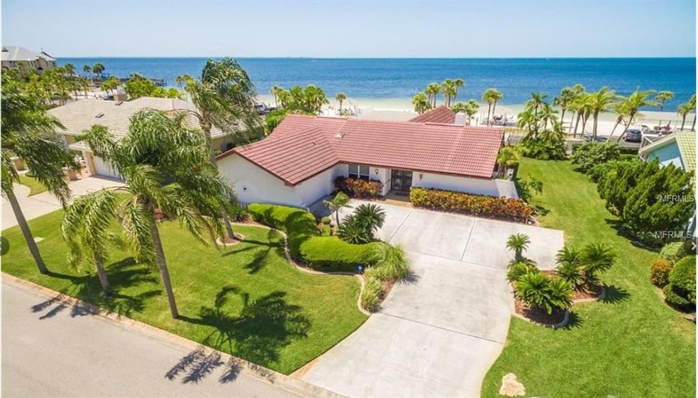 Directly on the private neighborhood beach.  Watch